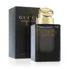 A bottle of Gucci Intense Oud Eau De Parfum spray and its packaging. Voir les images du produit