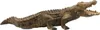 A realistic toy crocodile with its mouth open, shown from a side view against a white background. Anteprima dell’immagine prodotto