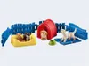 A toy dog play set with fences, a red tent, beds, and dog figures. Produktbild-Vorschau