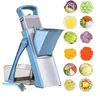 A blue and silver vegetable slicer is shown on a white background, with multiple small circular images of sliced vegetables and fruits arranged around it. Voir les images du produit