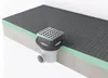 A cross-section of a shower element showing the layers and a drain assembly. Produktbild-Vorschau