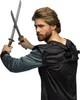 A man holding two ninja swords. Voir les images du produit