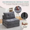 A grey foldable sofa bed is shown in a room with decorative elements and text overlays highlighting its features. Náhled obrázku produktu