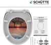 A toilet seat with a sunset sky motif, along with its instruction manual and mounting hardware. Anteprima dell’immagine prodotto