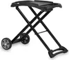 A black foldable grill table with wheels on a white background. Anteprima dell’immagine prodotto
