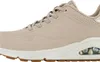 A side view of a beige Skechers sneaker. Produktbild-Vorschau