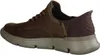 Side view of a brown Skechers slip-on sneaker. Voir les images du produit