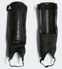 A pair of black Adidas shin guards are shown against a white background. Produktbild-Vorschau