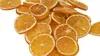 A pile of dried orange slices on a white background. Produktbild-Vorschau