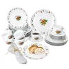 A set of Christmas-themed porcelain dinnerware with gingerbread man and candy cane motifs. Náhled obrázku produktu
