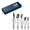 A diagram showing the dimensions and weights of a cutlery set, with a box containing cutlery in the background. Produktbild-Vorschau