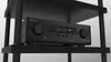 A black Pioneer AV receiver is placed on a black shelf. Produktbild-Vorschau