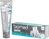 A tube of toothpaste and its box are displayed against a white background. Produktbild-Vorschau