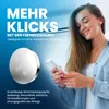A woman is holding a remote control and looking at it with a smile. A coin cell battery is shown in the foreground. Produktbild-Vorschau