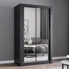 A modern bedroom or living room scene featuring a black sliding door wardrobe with mirrored doors, reflecting a sofa and a coffee table. Produktbild-Vorschau