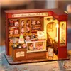 A miniature dollhouse-style dessert shop. Anteprima dell’immagine prodotto