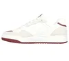 A side view of a white sneaker with red accents. Anteprima dell’immagine prodotto