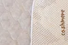 A close-up view of a quilted mattress cover, showing the texture and a section with the word 'cashmere' printed on it. Náhľad obrázku produktu