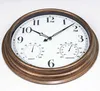 A round wall clock with a gold-colored frame, displaying the time, temperature, and humidity. Produktbild-Vorschau