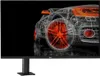 A wireframe rendering of a car on a black background, displayed on an LG monitor. Produktbild-Vorschau