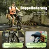 A man riding an electric bike with cargo baskets, with close-ups of the front fork and seat post suspension. Produktbild-Vorschau