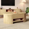 A living room scene featuring a wooden coffee table in front of a TV stand. Náhľad obrázku produktu