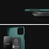 A dark background with a green phone case and a black accessory. Podgląd zdjęcia produktu