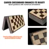 Collage of images showing a foldable wooden chessboard with carved details and numerical annotations. Produktbild-Vorschau