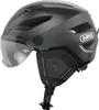 A studio shot of a black bicycle helmet with a visor. Voir les images du produit