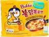 The image shows the front packaging of Samyang Buldak Cheese Hot Chicken Flavor Ramen. Voir les images du produit