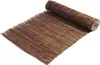 A rolled-up mat made of natural materials, likely for outdoor use. Produktbild-Vorschau