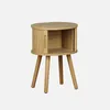 A round wooden bedside table with slatted doors on a white background. Produktbild-Vorschau