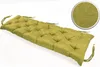 A tufted bench cushion in a light green color, shown on a white background with a close-up inset of the fabric texture. Produktbild-Vorschau
