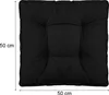 A black square cushion with a textured surface and tufted details is shown from a top-down perspective. Dimensions are indicated by lines and text. Produktbild-Vorschau