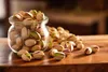 Solené pistácie ve skořápce, 500 g – Křupavé pražené Náhled obrázku produktu 4