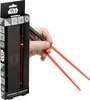 A hand holding Star Wars lightsaber chopsticks, with the product packaging visible on the left. Náhľad obrázku produktu