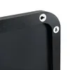 A close-up view of the corner of a black framed mirror, showing two white hanging hooks on the back. Produktbild-Vorschau