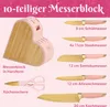 A pink heart-shaped knife block with various knives and kitchen shears displayed around it, along with text describing the product. Produktbild-Vorschau