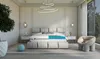 A cutaway view of a mattress topper is shown on a bed in a bedroom setting. Produktbild-Vorschau