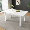 A white dining table with a bowl of fruit and a vase with plants on it, set in a modern dining room. Anteprima dell’immagine prodotto