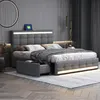 A modern bedroom with a grey upholstered bed featuring integrated LED lighting and storage drawers. Produktbild-Vorschau
