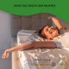 A woman is stretching in bed with sunlight streaming in. Produktbild-Vorschau