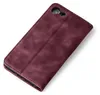 A burgundy flip case for a smartphone is shown on a white background. Produktbild-Vorschau