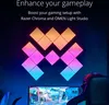 A gaming setup with RGB LED panels on the wall and a monitor displaying a game. Náhľad obrázku produktu