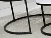 Close-up of the base of two nesting tables on a white rug. Náhľad obrázku produktu