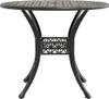 A studio shot of a round garden table. Náhľad obrázku produktu