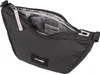 A black Pacsafe crossbody bag is shown from a slightly elevated angle with the main zipper open, revealing the interior. Anteprima dell’immagine prodotto