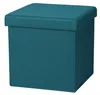 A teal colored storage ottoman on a white background. Produktbild-Vorschau