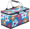 A close-up, front-facing view of a folding picnic basket with a floral pattern. Náhled obrázku produktu