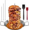 A vertical spit grill set with meat stacked on the spit, along with skewers and basting brushes. Produktbild-Vorschau